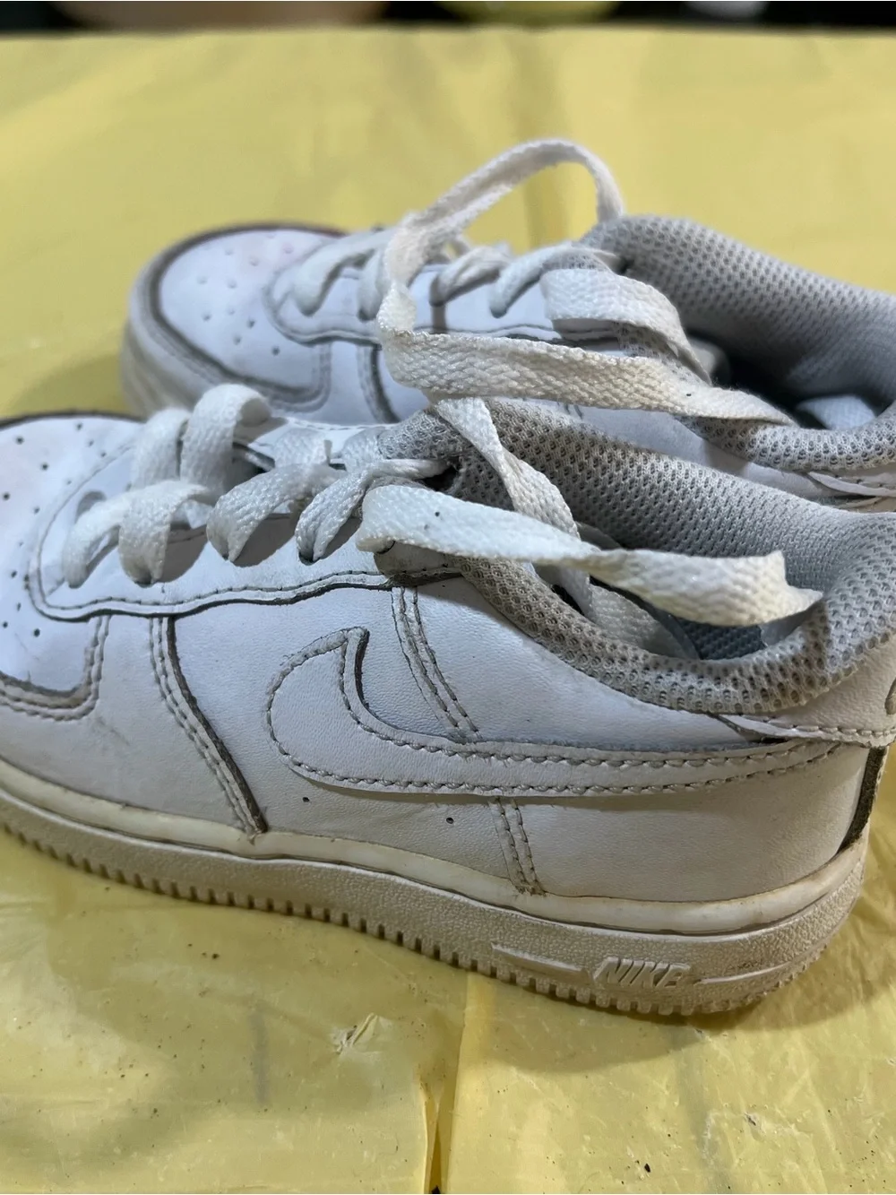 Nike Kids White Lace-Up Sneakers with Subtle Red Accent